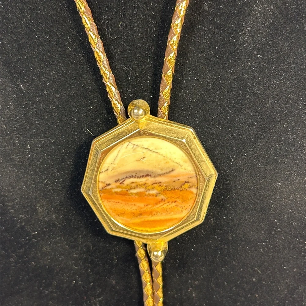 Vintage Bolo tie western leather, with ornate medallion, space for silver dollar